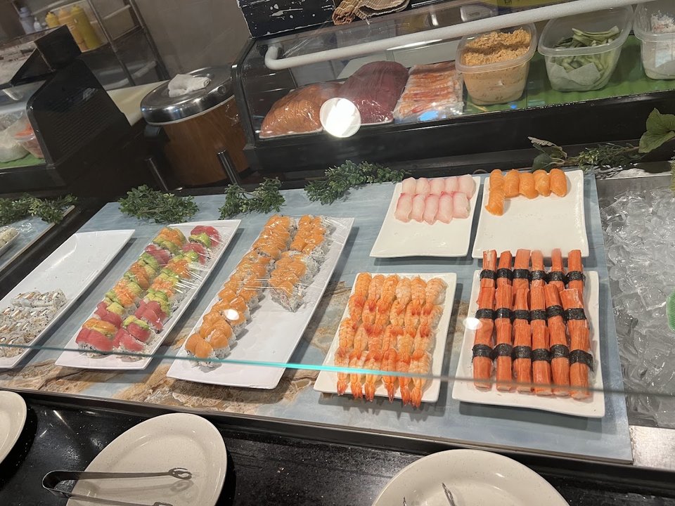 Seafood buffet with crab legs and sushi.