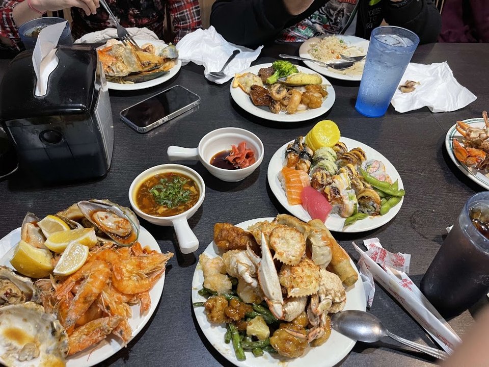 Menu board with seafood combo options.