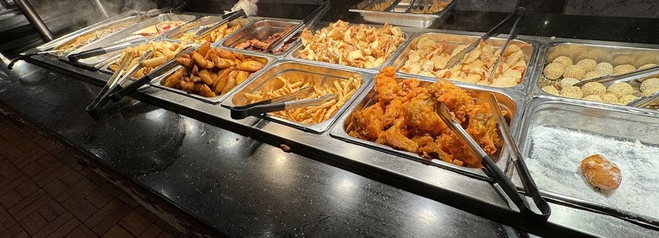 Menu board with seafood combo options.