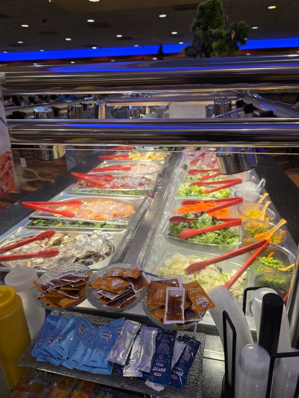 Printed menu with seafood, chicken, and noodles.