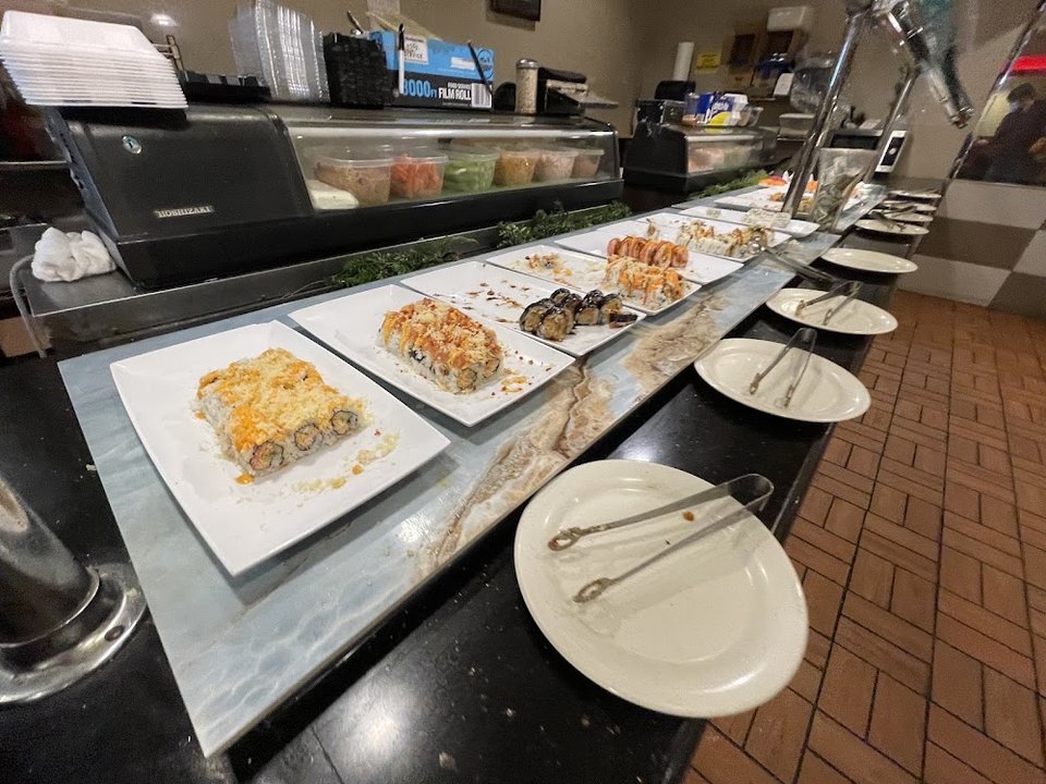 Menu board with seafood combo options.